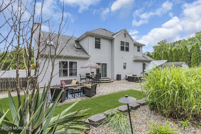 1771 Calico Ln, Toms River, NJ 08753 - back of house featuring a patio, a chimney, outdoor lounge area, and roof with shingles