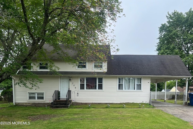 706 Tide Pl, Neptune Township, NJ 07753 - view of front of house featuring an attached carport and asphalt driveway