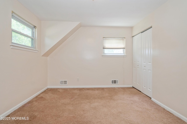 706 Tide Pl, Neptune Township, NJ 07753 - bonus room featuring plenty of natural light and carpet flooring