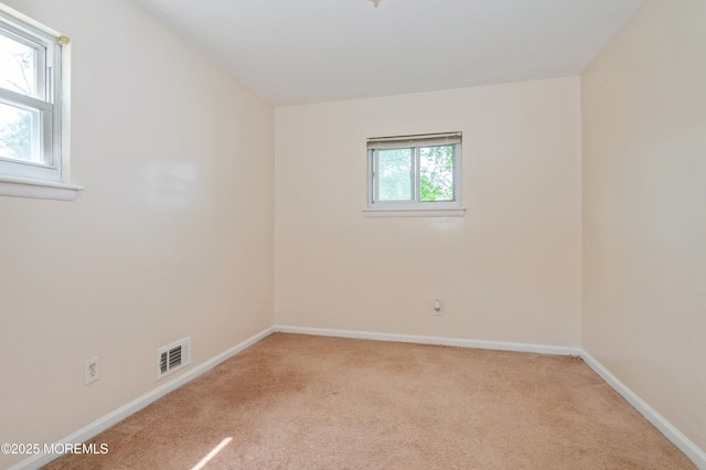 706 Tide Pl, Neptune Township, NJ 07753 - carpeted empty room with baseboards