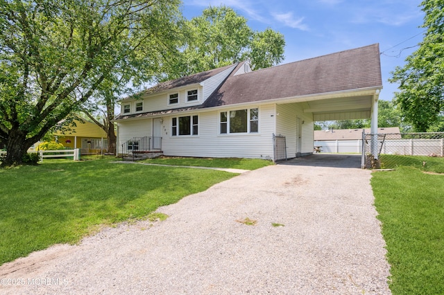 706 Tide Pl, Neptune Township, NJ 07753 - view of front facade with driveway, a shingled roof, and an attached carport