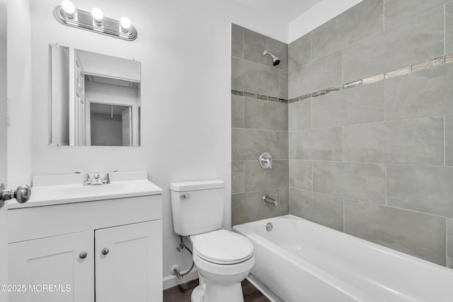 10D Heron St, Manchester, NJ 08759 - full bathroom featuring vanity, toilet, tub / shower combination, wood finished floors, and baseboards