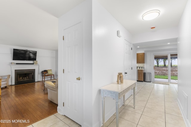 39 Sarah Ln, Howell, NJ 07731 - hallway featuring light tile patterned floors and baseboards