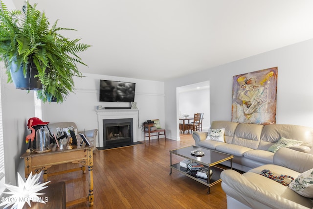 39 Sarah Ln, Howell, NJ 07731 - living room featuring hardwood / wood-style floors and a fireplace with flush hearth