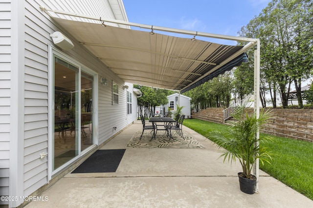 39 Sarah Ln, Howell, NJ 07731 - view of patio / terrace with outdoor dining space and an outbuilding