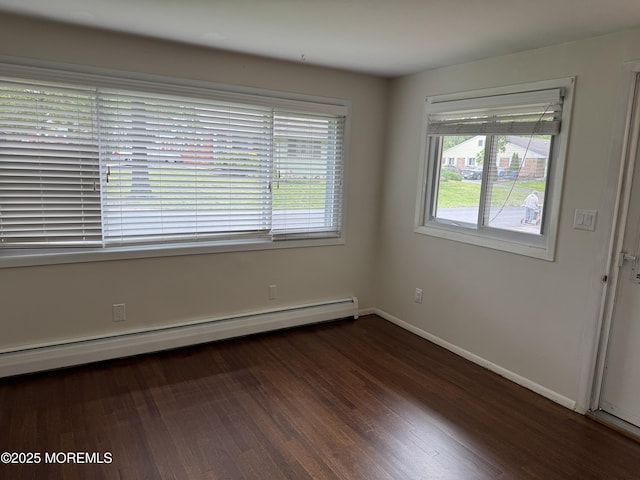 3B Blue Jay St, Manchester, NJ 08759 - empty room with a baseboard radiator, wood finished floors, and baseboards