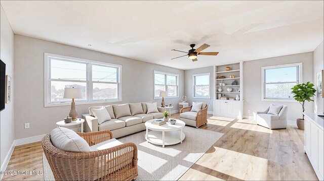 6 Lake Superior Dr, Little Egg Harbor, NJ 08087 - living room featuring light wood-type flooring and ceiling fan