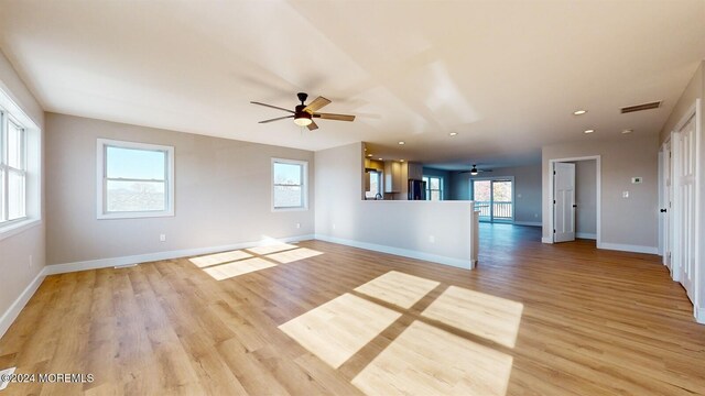 6 Lake Superior Dr, Little Egg Harbor, NJ 08087 - unfurnished living room with a ceiling fan, light wood-style floors, and recessed lighting