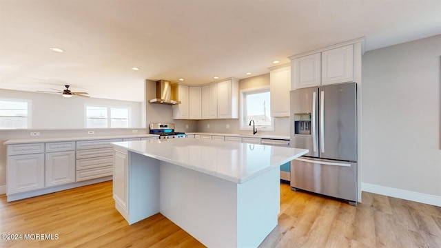 6 Lake Superior Dr, Little Egg Harbor, NJ 08087 - kitchen featuring appliances with stainless steel finishes, wall chimney range hood, plenty of natural light, a kitchen island, and recessed lighting
