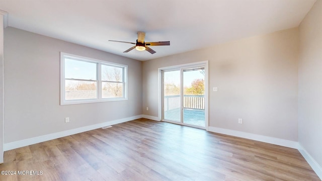 6 Lake Superior Dr, Little Egg Harbor, NJ 08087 - unfurnished room with healthy amount of natural light, ceiling fan, and wood finished floors