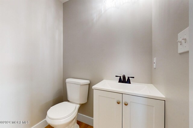 6 Lake Superior Dr, Little Egg Harbor, NJ 08087 - half bath with vanity and wood finished floors