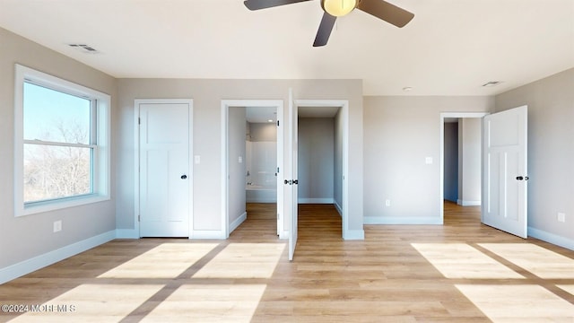 6 Lake Superior Dr, Little Egg Harbor, NJ 08087 - unfurnished bedroom featuring light wood-style flooring and a ceiling fan