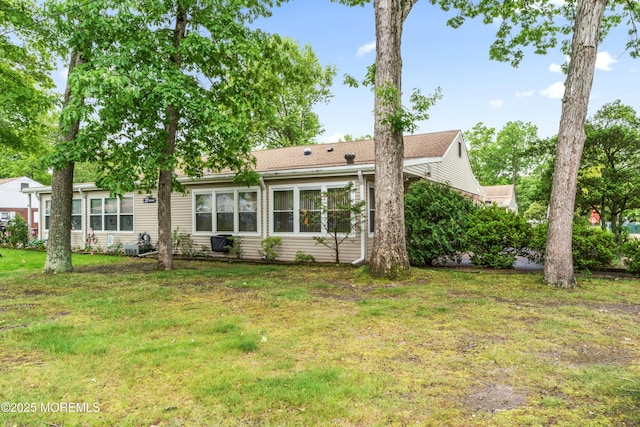 27 Cedar St Unit A, Toms River, NJ 08757 - back of house with a yard