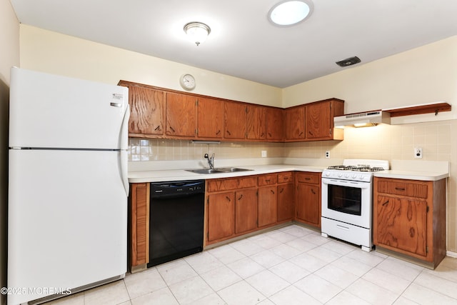 27 Cedar St Unit A, Toms River, NJ 08757 - kitchen featuring white appliances, a sink, light countertops, and under cabinet range hood