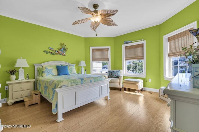 200 San Fernando Dr, Lavallette, NJ 08735 - bedroom featuring baseboards, light wood-style floors, crown molding, and ceiling fan