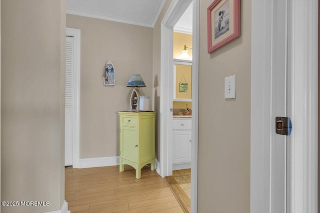 200 San Fernando Dr, Lavallette, NJ 08735 - corridor with light wood finished floors, ornamental molding, and baseboards