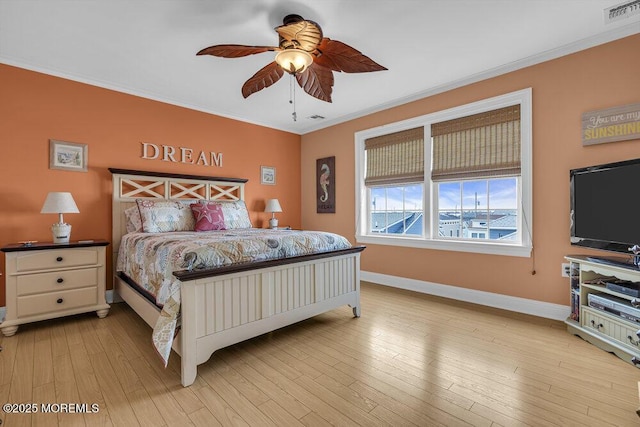 200 San Fernando Dr, Lavallette, NJ 08735 - bedroom featuring crown molding, baseboards, light wood finished floors, and a ceiling fan