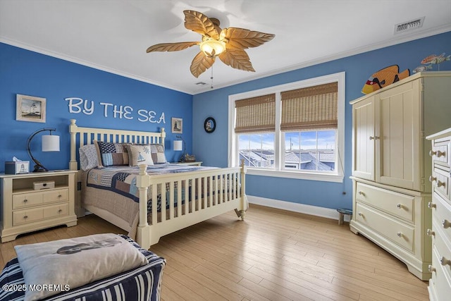 200 San Fernando Dr, Lavallette, NJ 08735 - bedroom with crown molding, baseboards, light wood-style flooring, and ceiling fan
