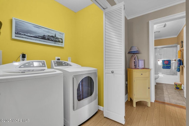 200 San Fernando Dr, Lavallette, NJ 08735 - washroom featuring separate washer and dryer, ornamental molding, light wood finished floors, and baseboards