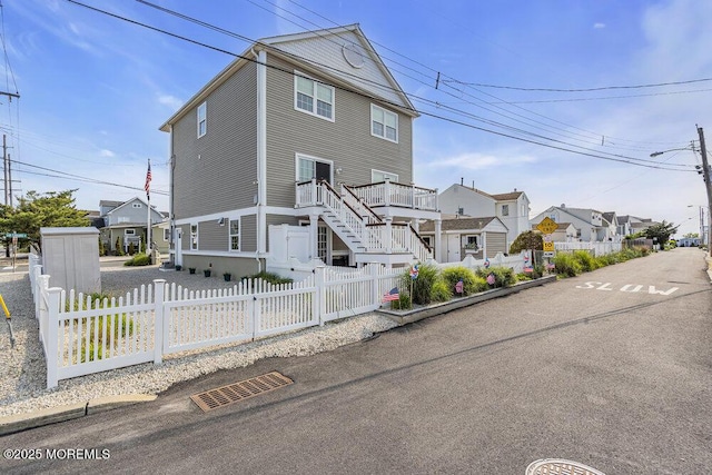 200 San Fernando Dr, Lavallette, NJ 08735 - view of front of property featuring a fenced front yard and a residential view