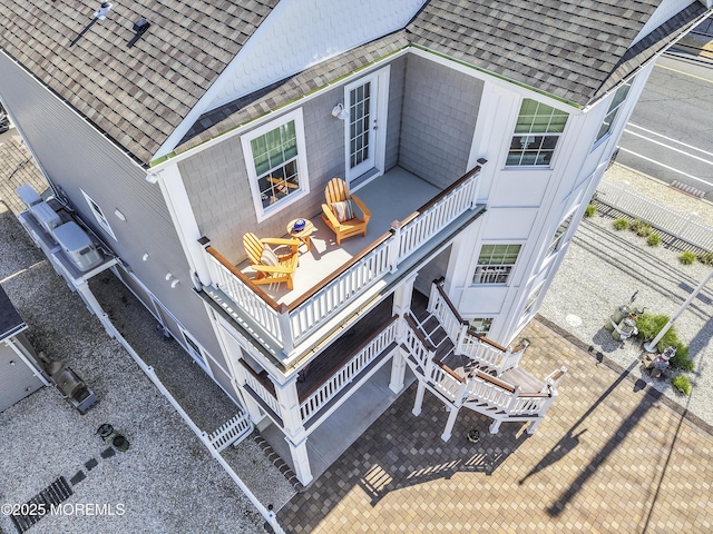 200 San Fernando Dr, Lavallette, NJ 08735 - rear view of house featuring roof with shingles and stairway
