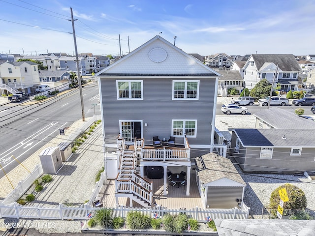 200 San Fernando Dr, Lavallette, NJ 08735 - rear view of house featuring a fenced backyard, a residential view, a deck, and stairs