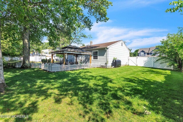 824 Broadway Blvd, Toms River, NJ 08757 - back of property with a gazebo and a chimney