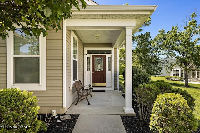 12 Stemson Ct, Little Egg Harbor, NJ 08087 - doorway to property with a porch