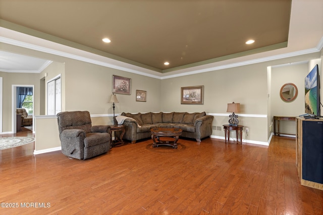 12 Stemson Ct, Little Egg Harbor, NJ 08087 - living area with wood finished floors, a raised ceiling, baseboards, ornamental molding, and recessed lighting