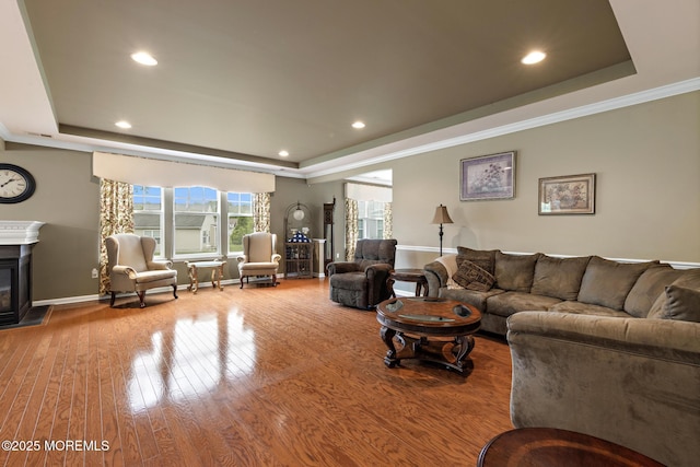 12 Stemson Ct, Little Egg Harbor, NJ 08087 - living area with a tray ceiling, wood finished floors, baseboards, recessed lighting, and ornamental molding