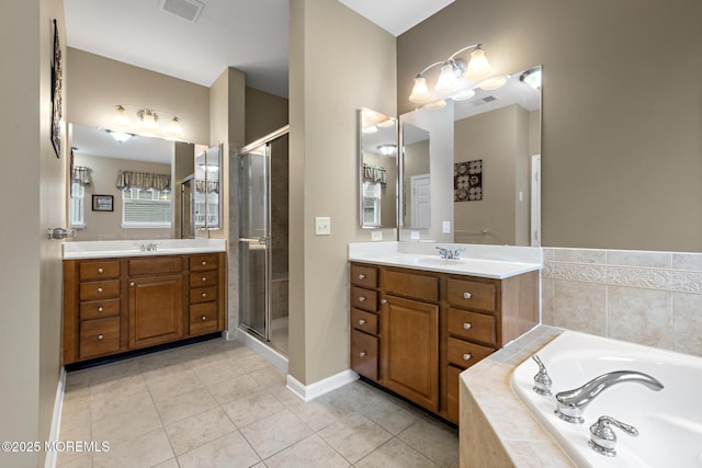 12 Stemson Ct, Little Egg Harbor, NJ 08087 - bathroom with tile patterned floors, two vanities, a bath, and a stall shower