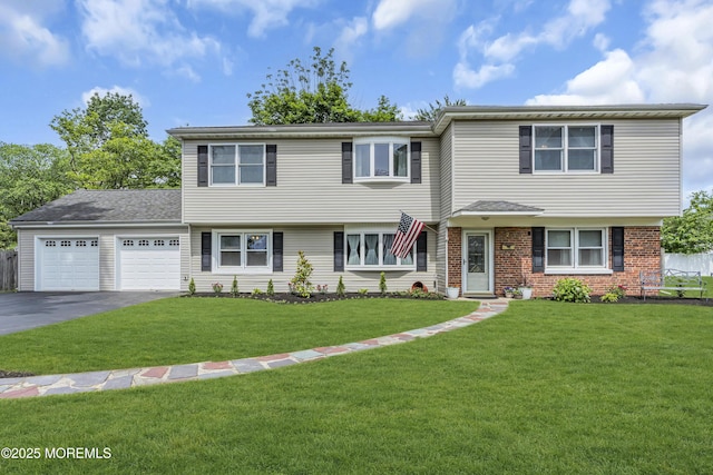 2 Miriam Dr, Matawan, NJ 07747 - view of front of property featuring an attached garage, driveway, and brick siding
