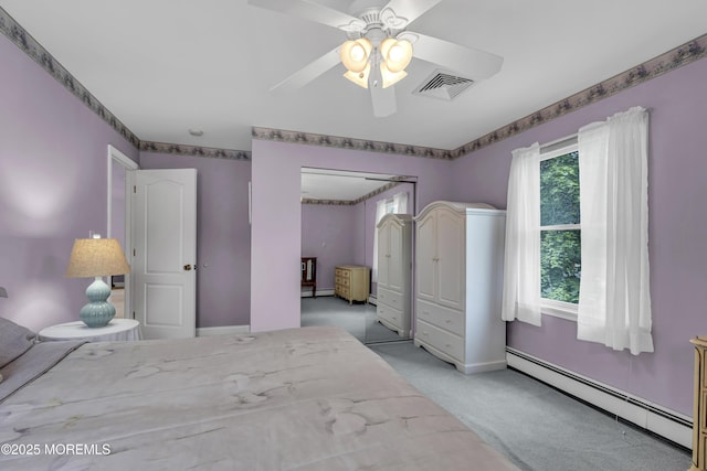 2 Miriam Dr, Matawan, NJ 07747 - bedroom with baseboard heating, light carpet, a closet, ceiling fan, and baseboards