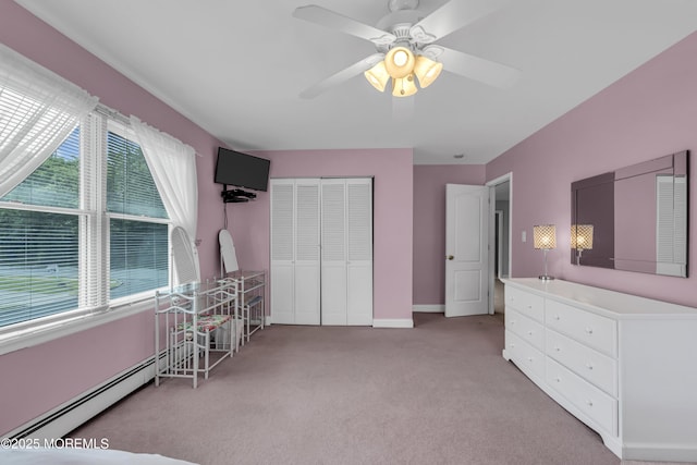 2 Miriam Dr, Matawan, NJ 07747 - carpeted bedroom featuring a closet, a baseboard heating unit, a ceiling fan, and baseboards