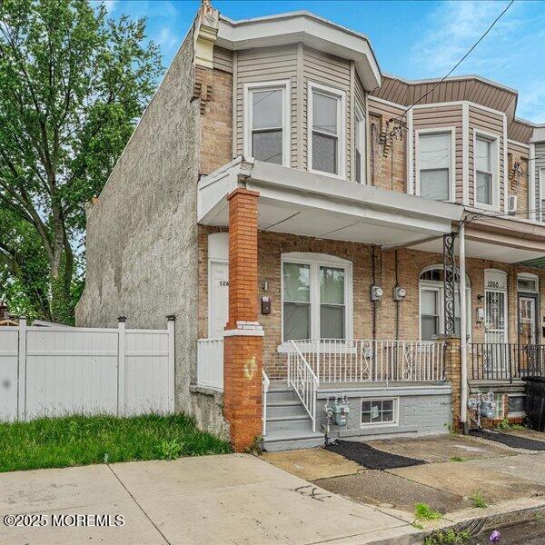 1262 Thurman St, Camden, NJ 08104 - multi unit property with covered porch and brick siding