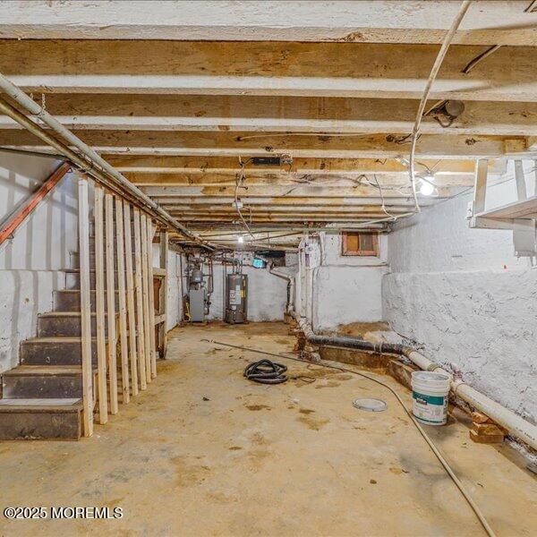 1262 Thurman St, Camden, NJ 08104 - unfinished below grade area with water heater and stairway