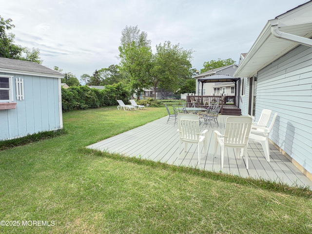 113 Boulder Lake Dr, Little Egg Harbor, NJ 08087 - view of grassy yard featuring a gazebo, a wooden deck, and an outdoor structure