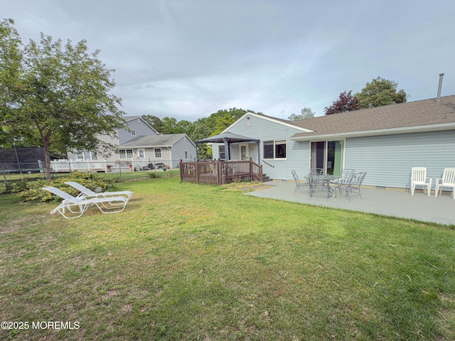 113 Boulder Lake Dr, Little Egg Harbor, NJ 08087 - view of yard with a deck and a patio