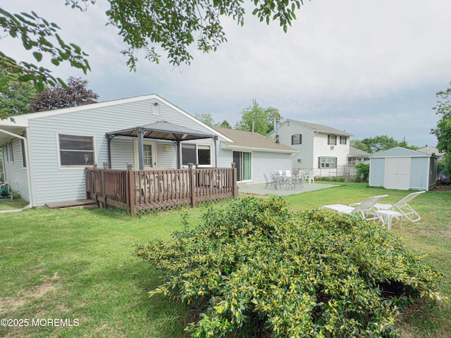 113 Boulder Lake Dr, Little Egg Harbor, NJ 08087 - back of house with a yard and a wooden deck