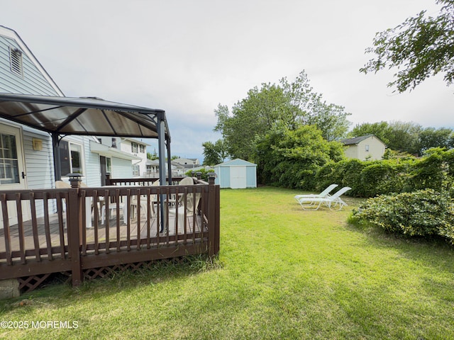 113 Boulder Lake Dr, Little Egg Harbor, NJ 08087 - view of green lawn with a deck and a gazebo