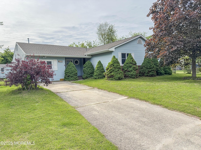 113 Boulder Lake Dr, Little Egg Harbor, NJ 08087 - view of front of home featuring a front yard, a shingled roof, and concrete driveway
