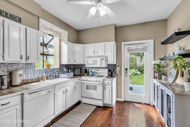 75 Portland Rd, Highlands, NJ 07732 - kitchen with white appliances, tile countertops, and white cabinetry