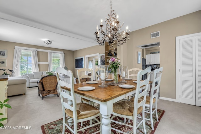 75 Portland Rd, Highlands, NJ 07732 - dining room featuring light carpet and a chandelier