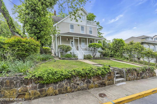 75 Portland Rd, Highlands, NJ 07732 - victorian house with a porch and a front yard