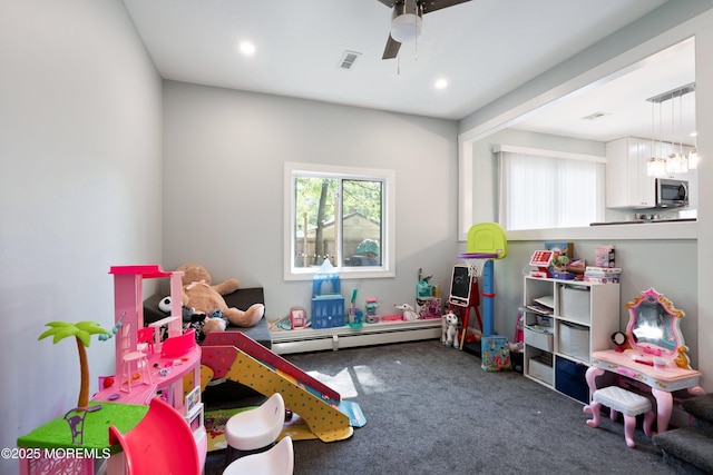 629 Alpine St, Forked River, NJ 08731 - playroom featuring a baseboard radiator, carpet, a ceiling fan, and recessed lighting
