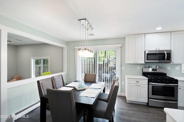 629 Alpine St, Forked River, NJ 08731 - dining space featuring a baseboard heating unit, dark wood-type flooring, a chandelier, and recessed lighting