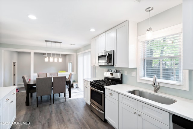 629 Alpine St, Forked River, NJ 08731 - kitchen featuring stainless steel appliances, a sink, light countertops, white cabinetry, and recessed lighting