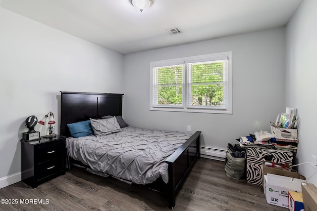 629 Alpine St, Forked River, NJ 08731 - bedroom featuring a baseboard heating unit and dark wood finished floors