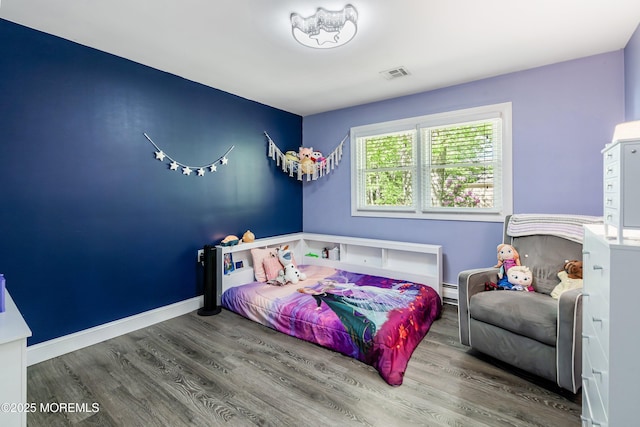 629 Alpine St, Forked River, NJ 08731 - bedroom with wood finished floors and baseboard heating