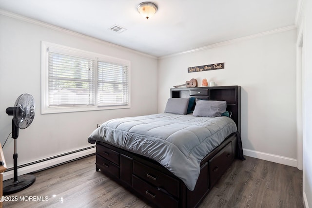 629 Alpine St, Forked River, NJ 08731 - bedroom with ornamental molding, wood finished floors, baseboards, and baseboard heating